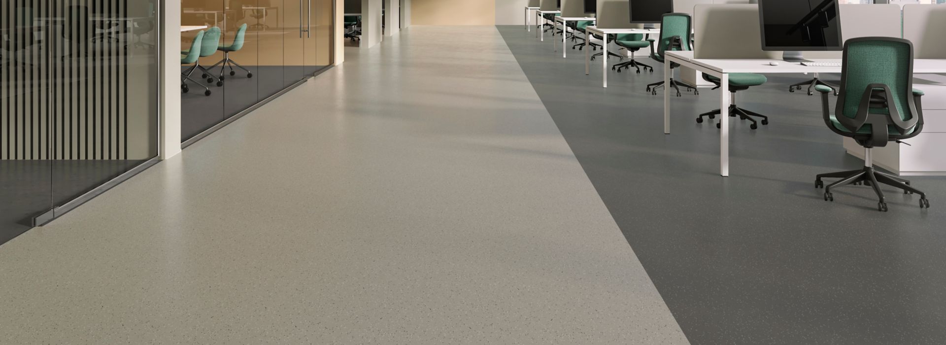 nora by Interface noraplan stone reflection breaking rubber flooring in open office workspace