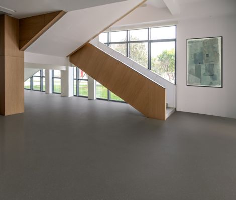 nora by Interface noraplan stone smooth rubber flooring in public space with stairwell image number 5