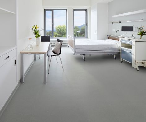 nora by Interface noraplan stone in healthcare patient room image number 9