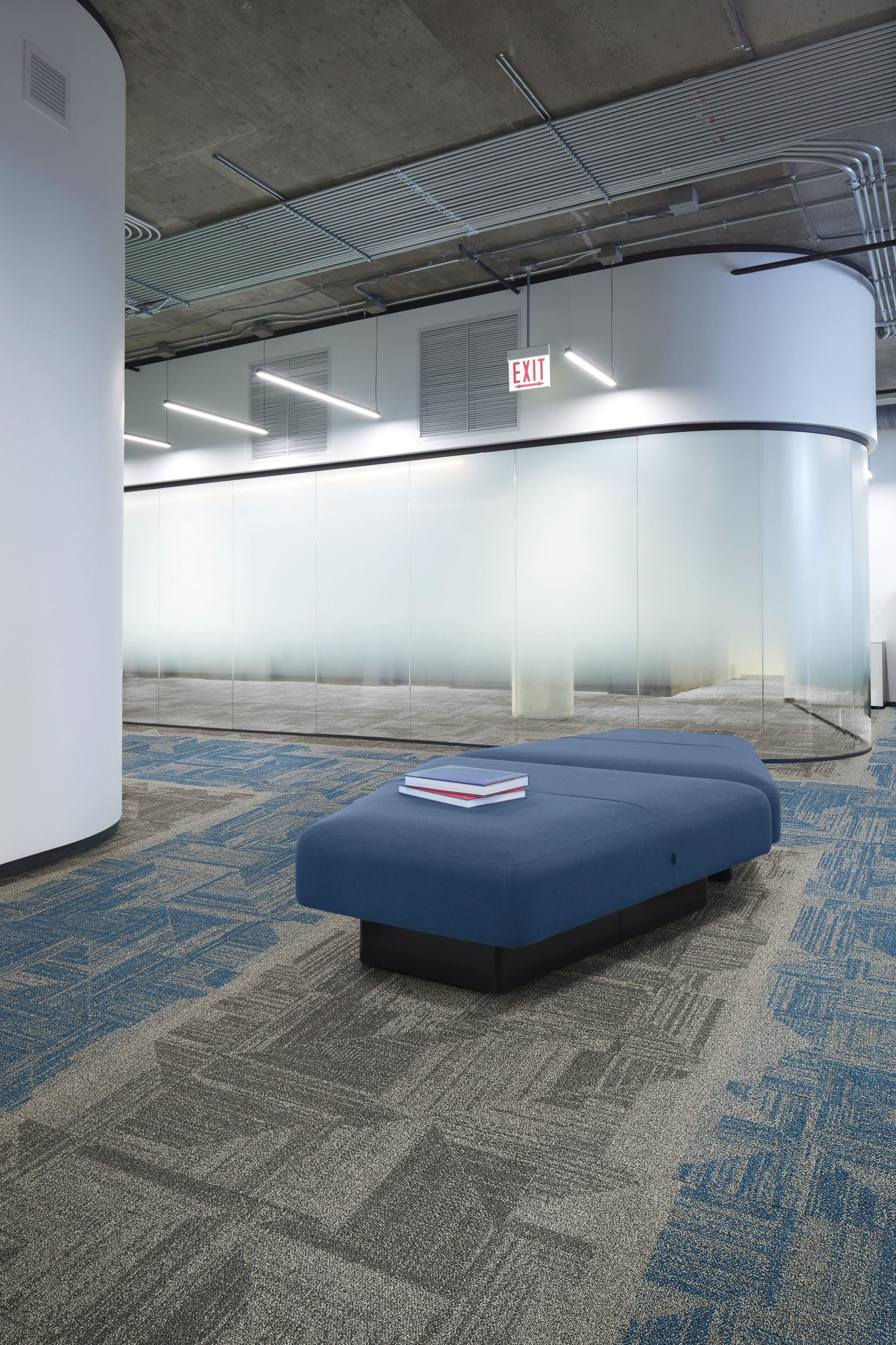 Interface Open Air 403 carpet tile in waiting area with small blue fabric bench and frosted glass walls image number 5