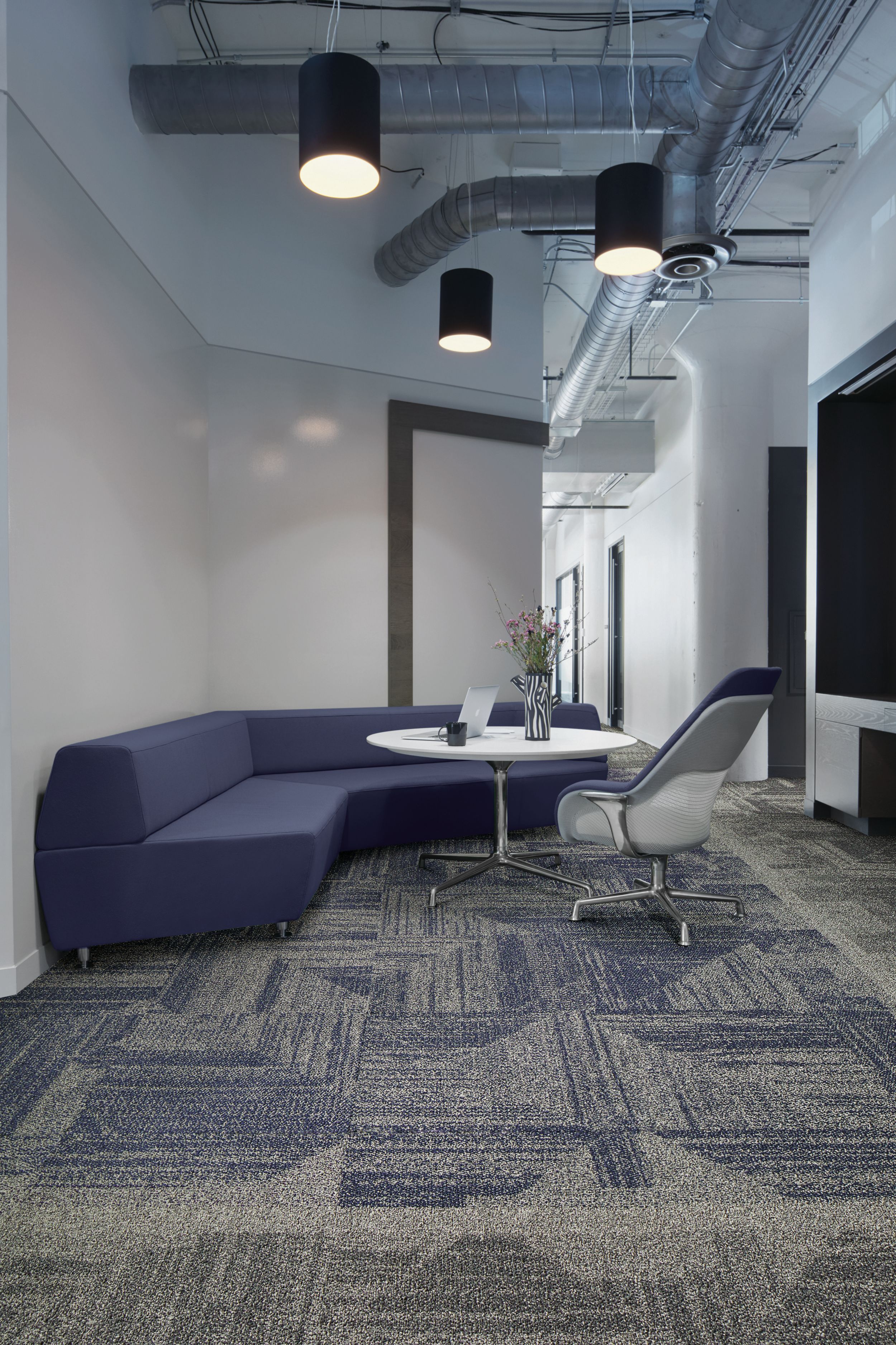 Interface Open Air 403 carpet tile with rounded blue corner bench with flower vase on table image number 8