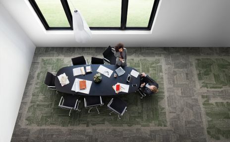 Interface Open Air 403 carpet tile in overhead view of meeting table with man and woman talking image number 4