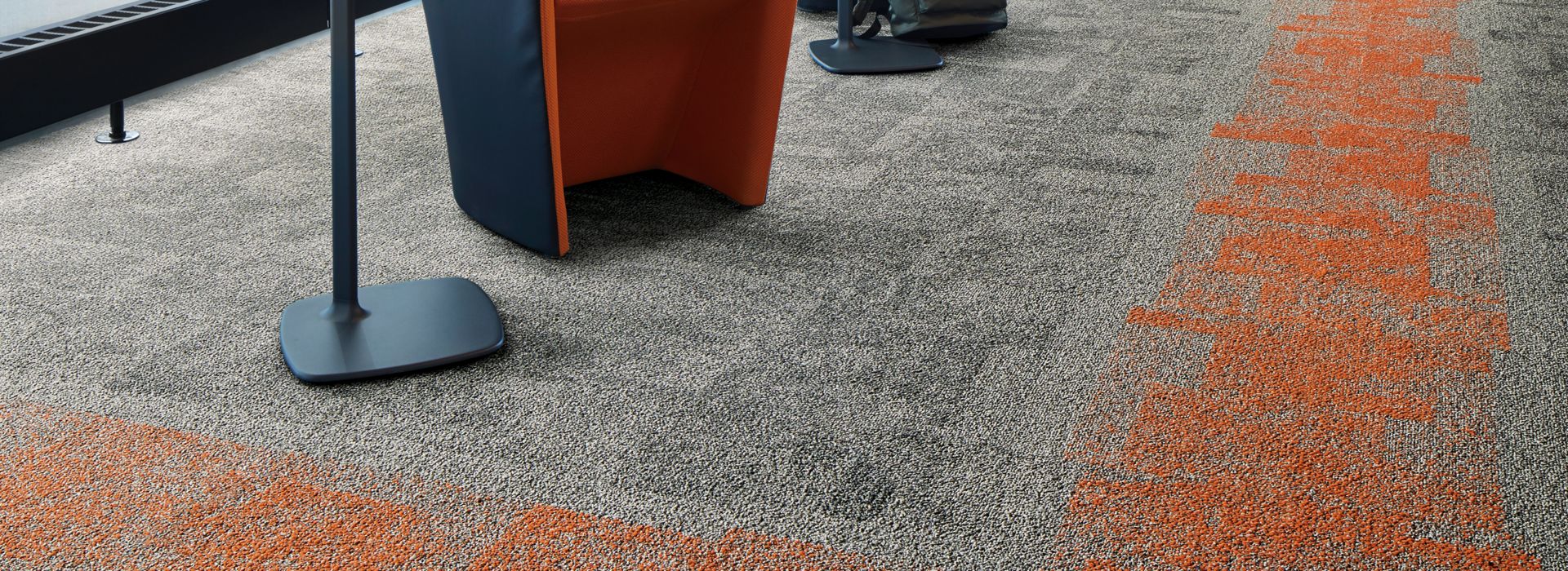 Interface Open Air 404 carpet tile in reception area with glass walls