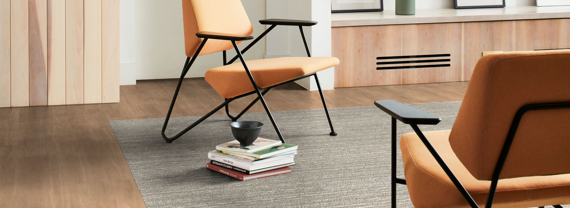 Interface On an Angle plank carpet tile with Natural Woodgrains plank LVT in workplace lounge