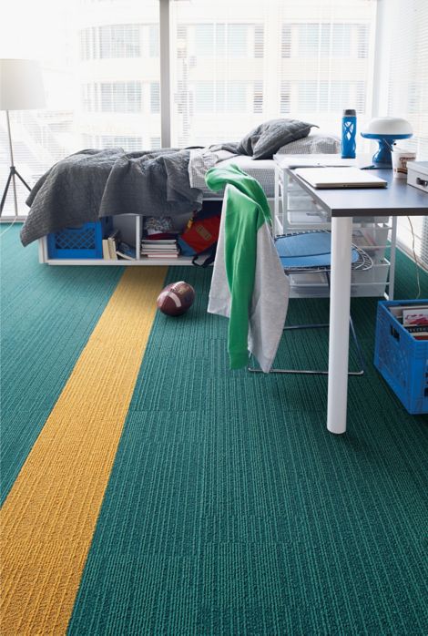 Interface On Line plank carpet tile in dorm room with football on floor image number 2