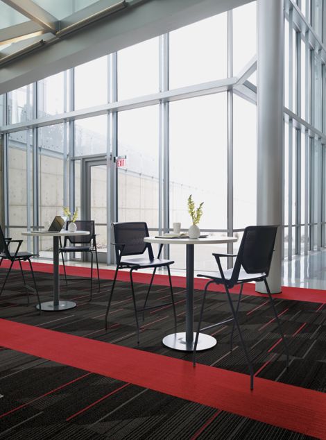 Interface Detours carpet tile and On Line plank carpet tile in seating area with glass windows