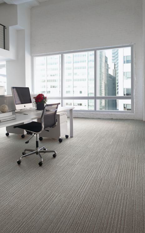 Interface On Line plank carpet tile with open workstation and roses on desk