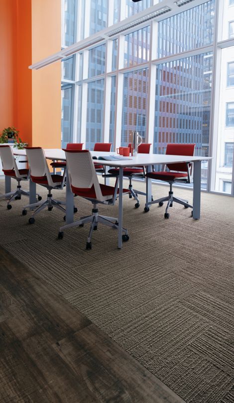 Interface On Line plank carpet tile in meeting room with orange wall and red chairs image number 9