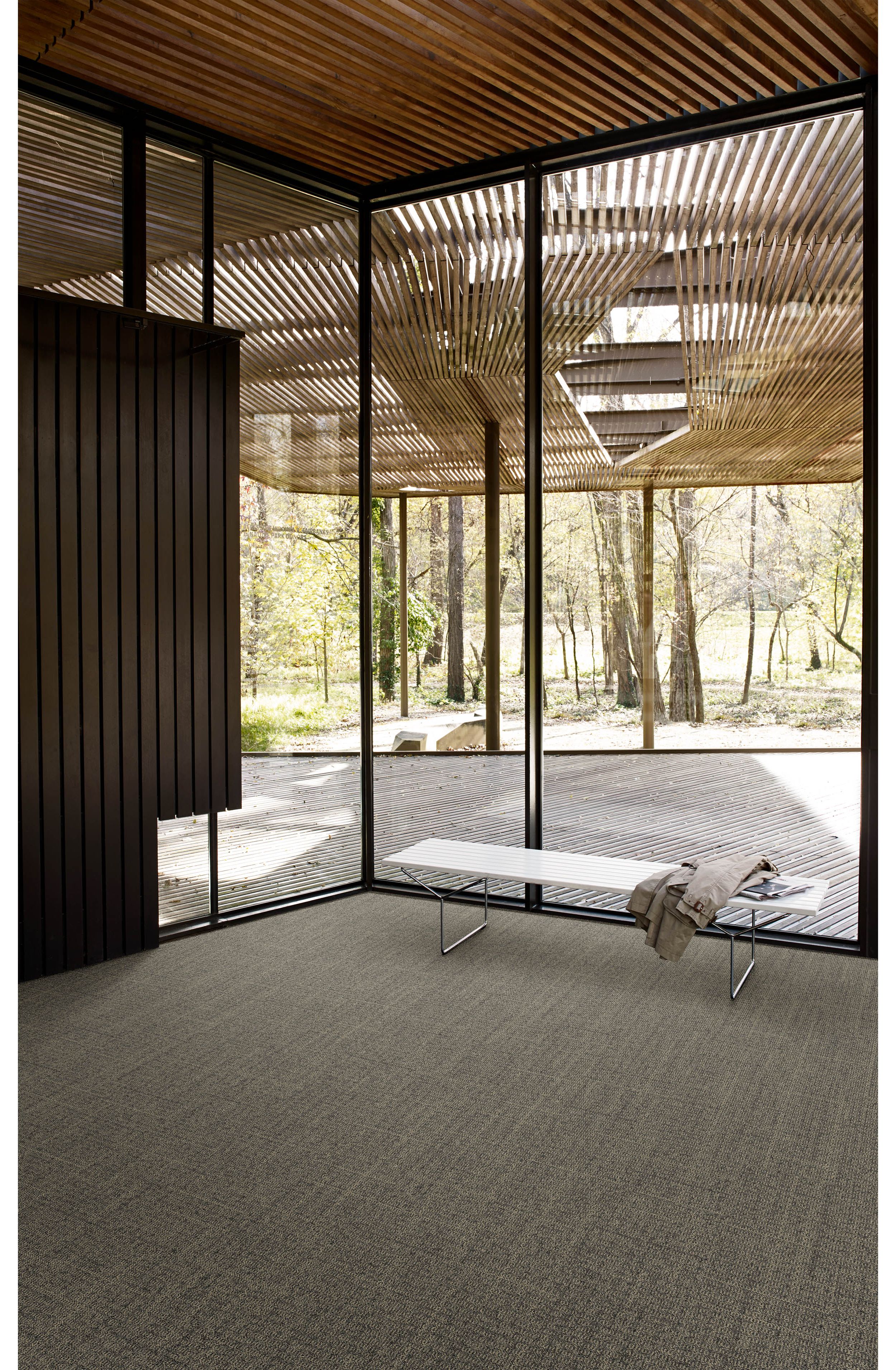 Interface Open Air 401 plank carpet tile with small white bench and wood slat ceiling image number 4