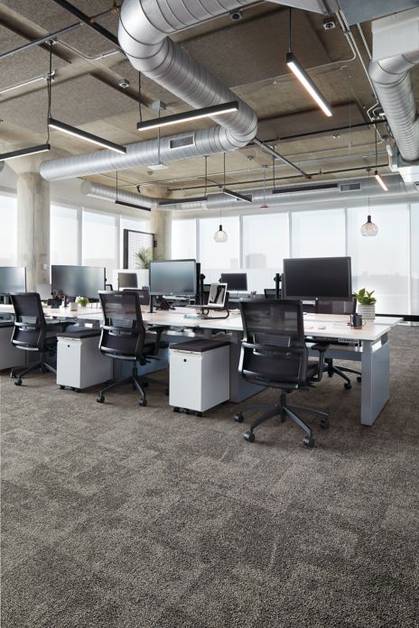 Interface Open Air 404 carpet tile in open workspace area with multiple workstations with computers