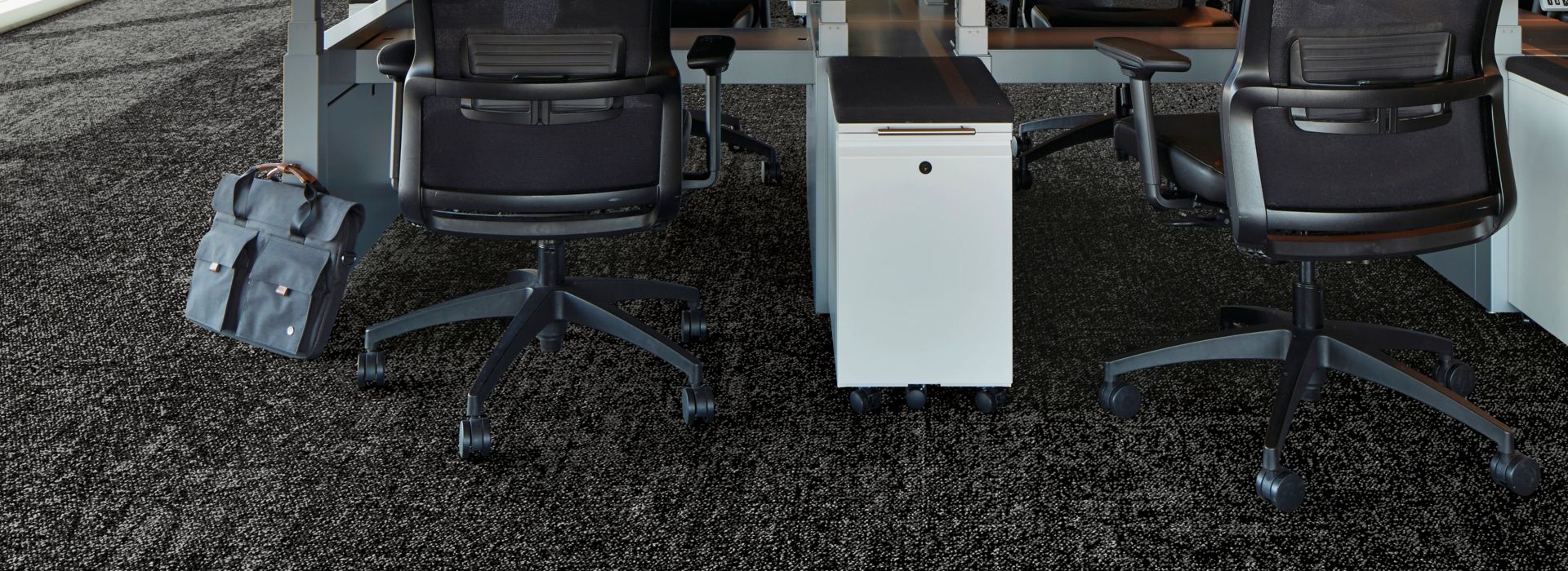 Interface Open Air 419 carpet tile in open work area with multiple workstations