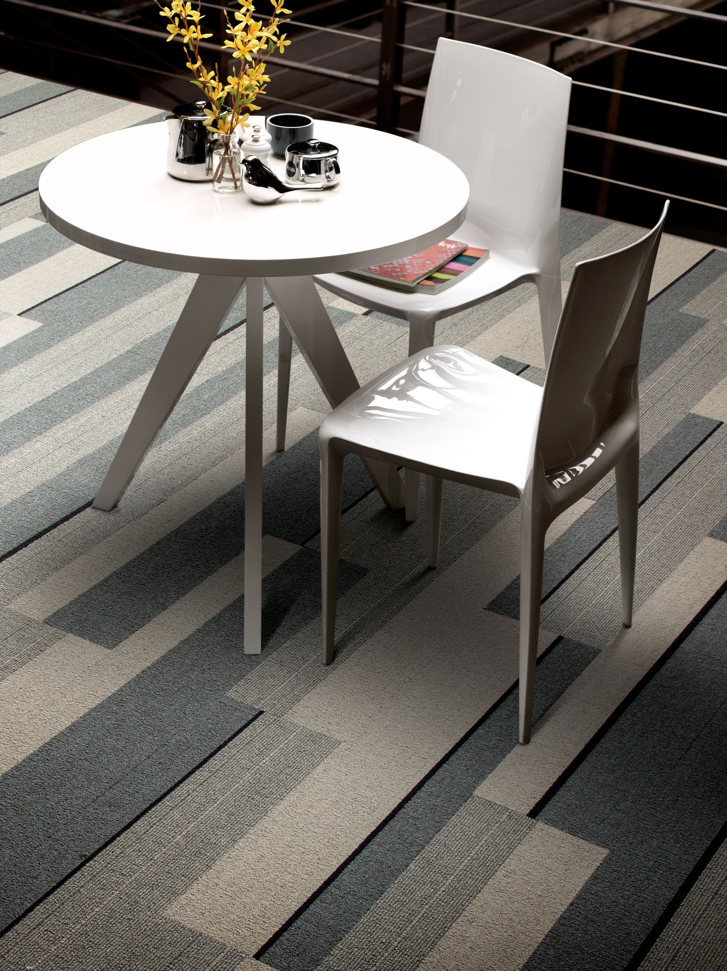 Interface PH210 plank carpet tile in small seating area with flowers on table image number 1