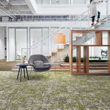 Interface Painted Gesture plank carpet tile and Textured Woodgrains LVT in open room with women walking up stairwell in background image number 1