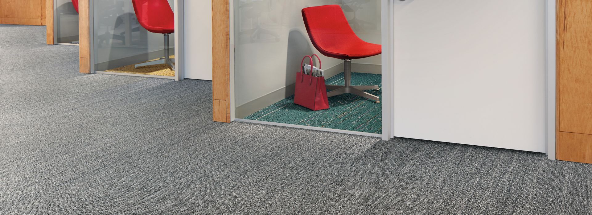 Interface Plain Stitch and Circuit Board plank carpet tile in area with multiple private rooms