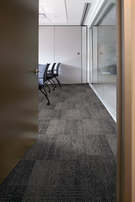 Interface Plain Weave carpet tile in doorway of meeting room