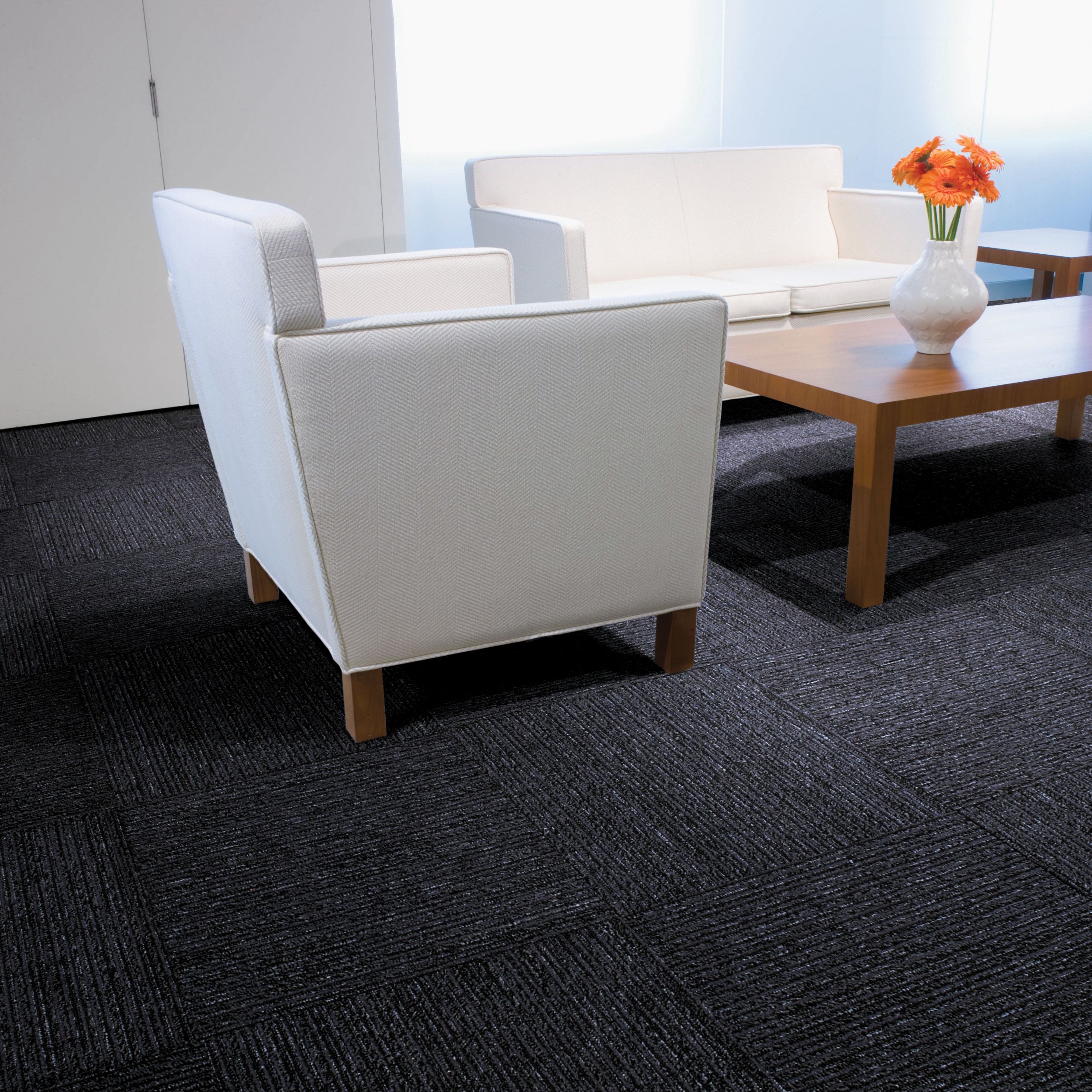 Interface Platform carpet tile in seating area with flowers on wooden table image number 5