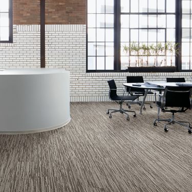 Interface Progression I plank carpet tile in meeting area with four chairs and table