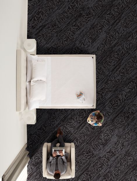 Interface RMS 507 and RMS 508 plank carpet tile in hotel guest room with woman on computer and girl holding stuffed animal image number 7