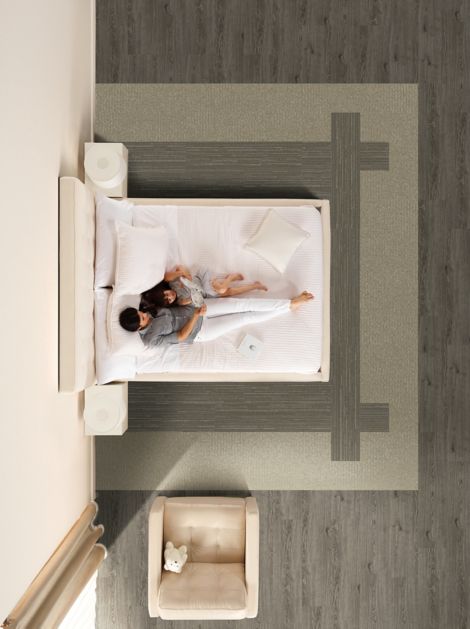 Interface RMS 702 and RMS 703 plank carpet tile with Natural Woodgrains LVT in hotel guest room