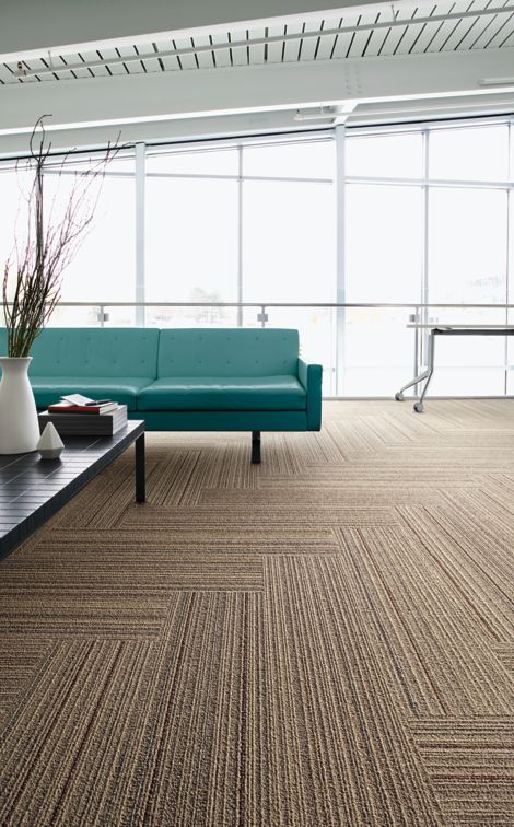 Interface SL920 plank carpet tile in seating area with green couch imagen número 2