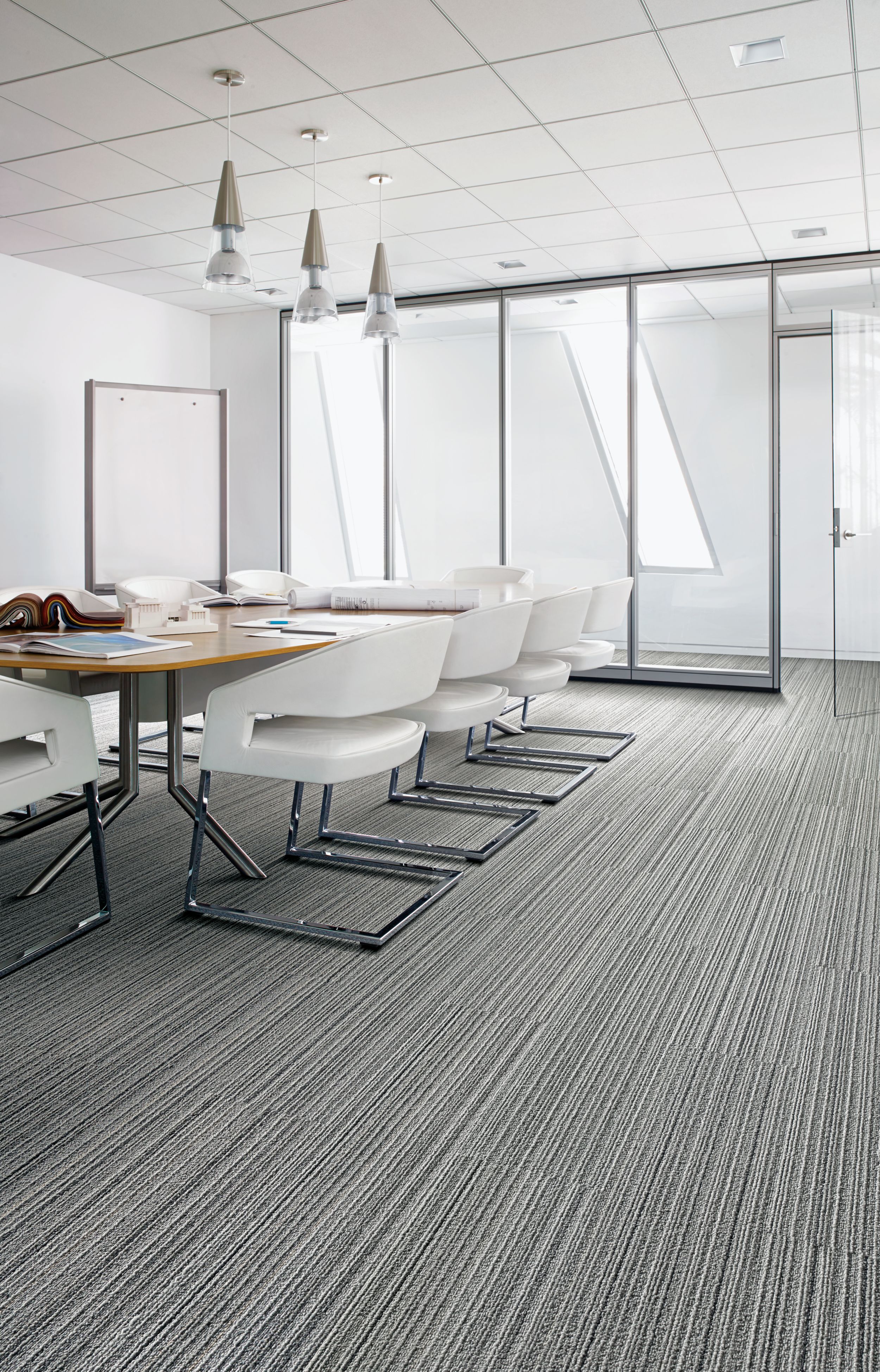 Interface SL920 plank carpet tile in meeting area with table and white chairs image number 1