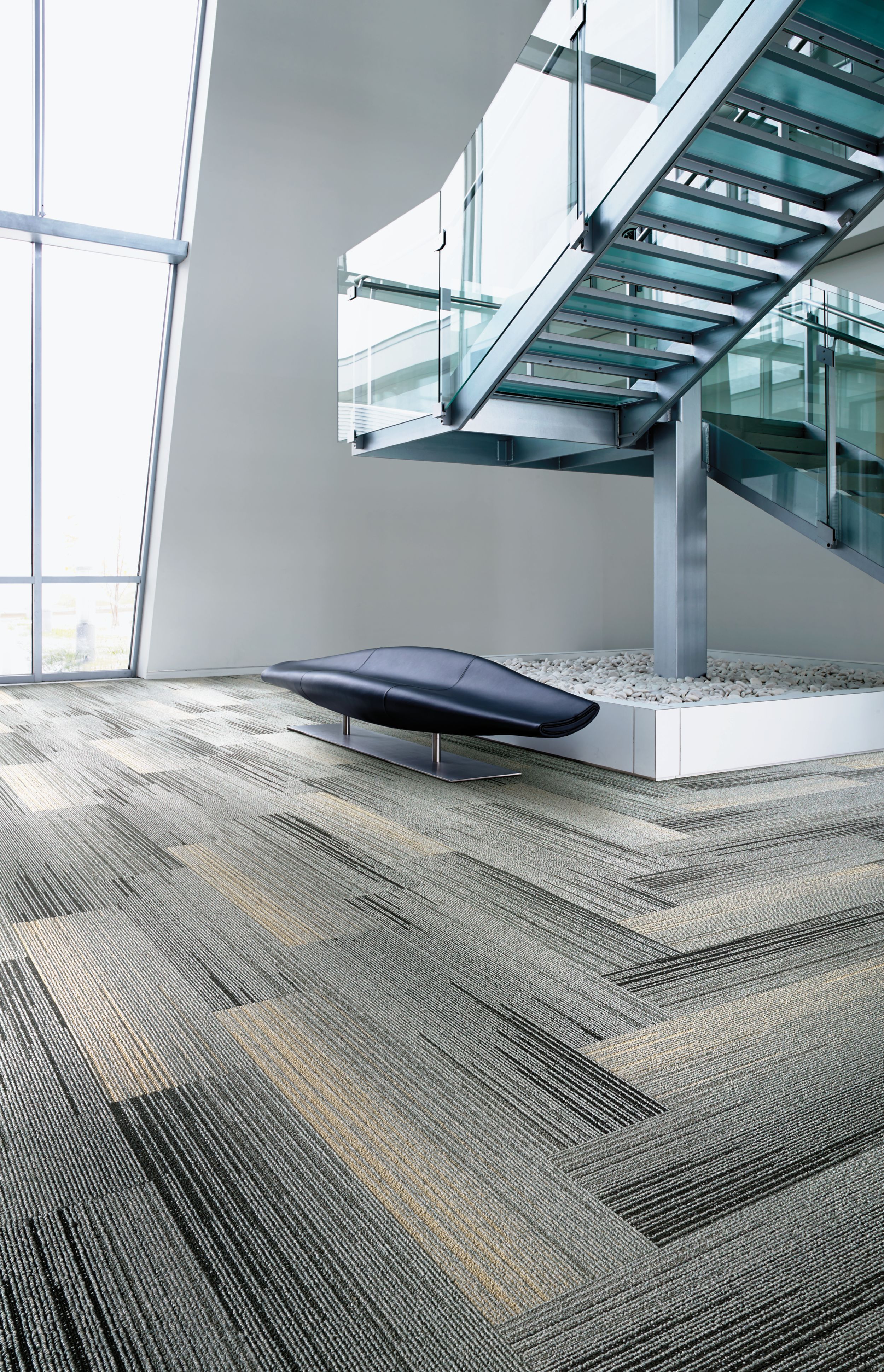 Interface SL930 plank carpet tile in stairwell area with bench image number 1