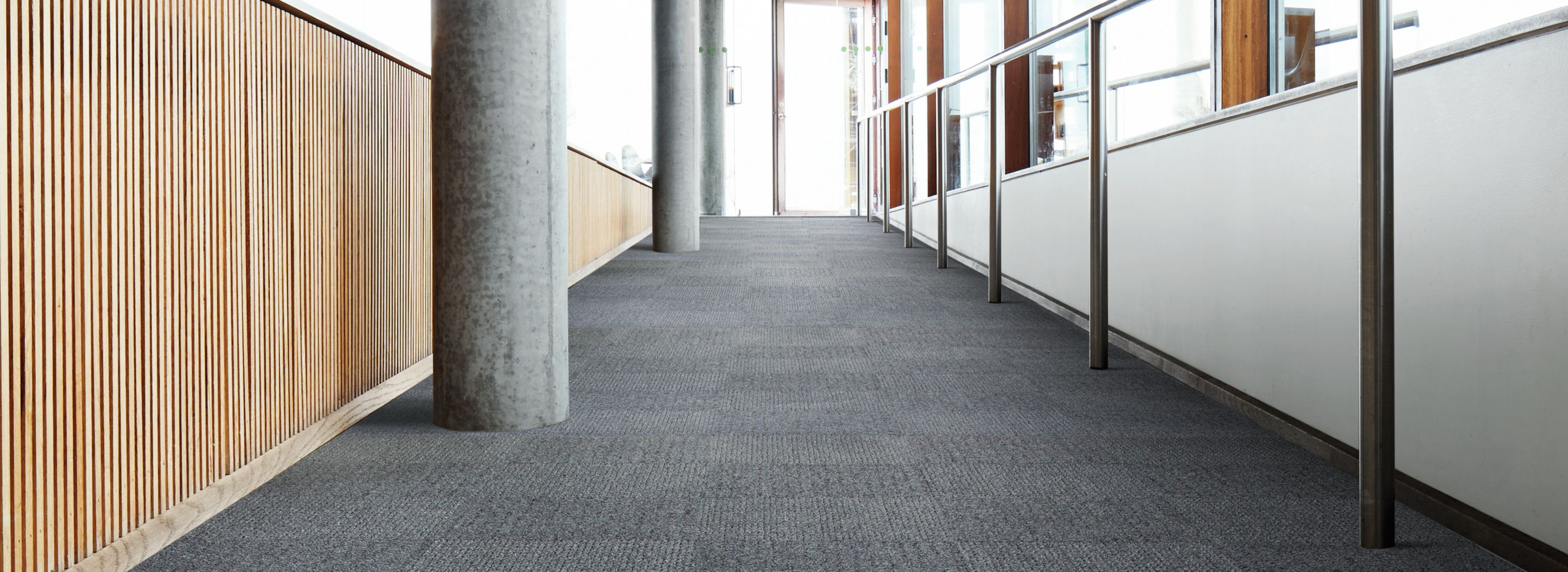 Interface SR799 carpet tile in a hallway setting with columns image number 1