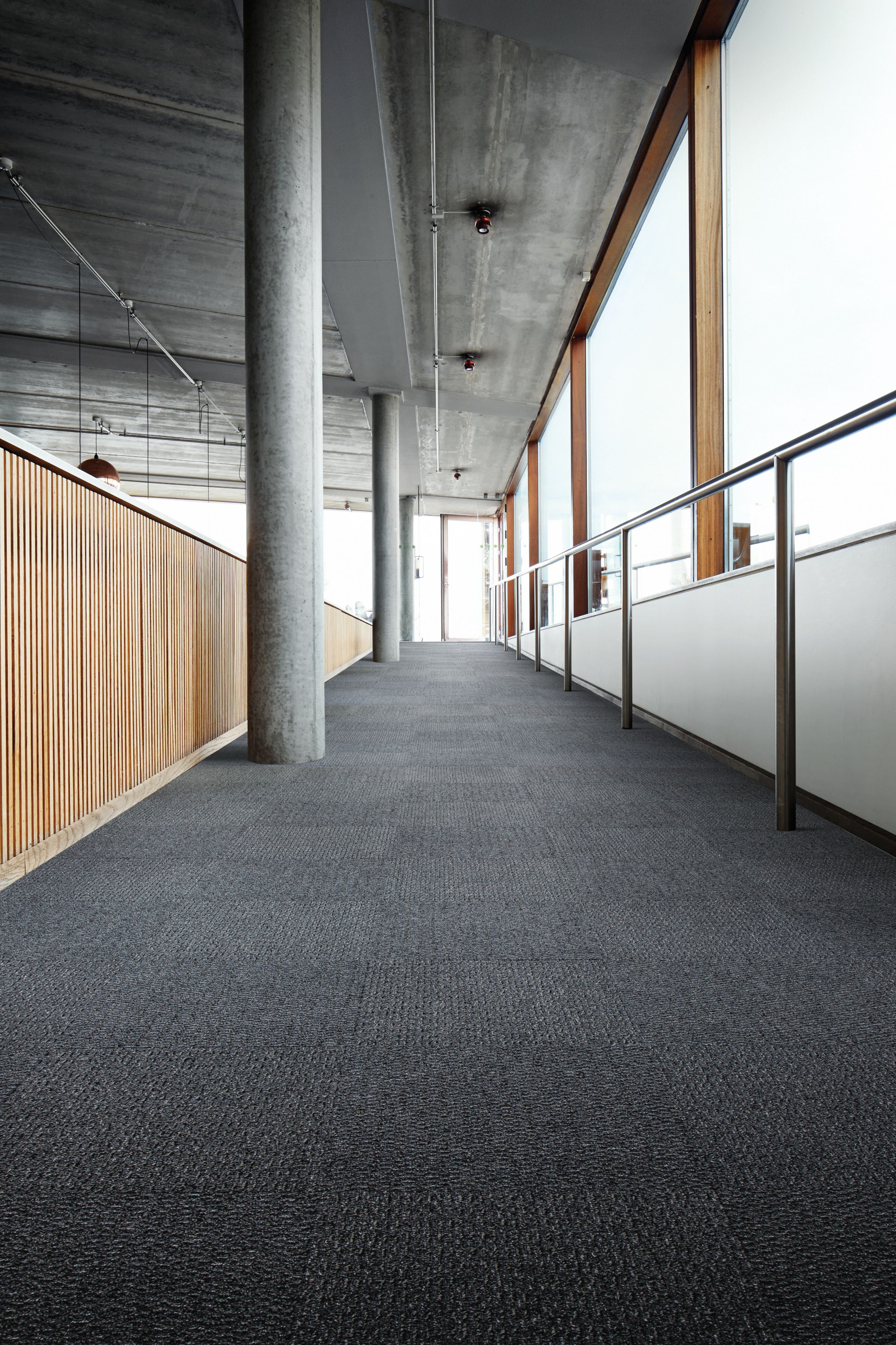 Interface SR799 carpet tile in a hallway setting with columns image number 1