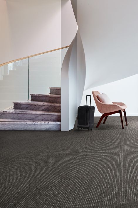 Interface SR899 carpet tile in public space with curved stairwell image number 6