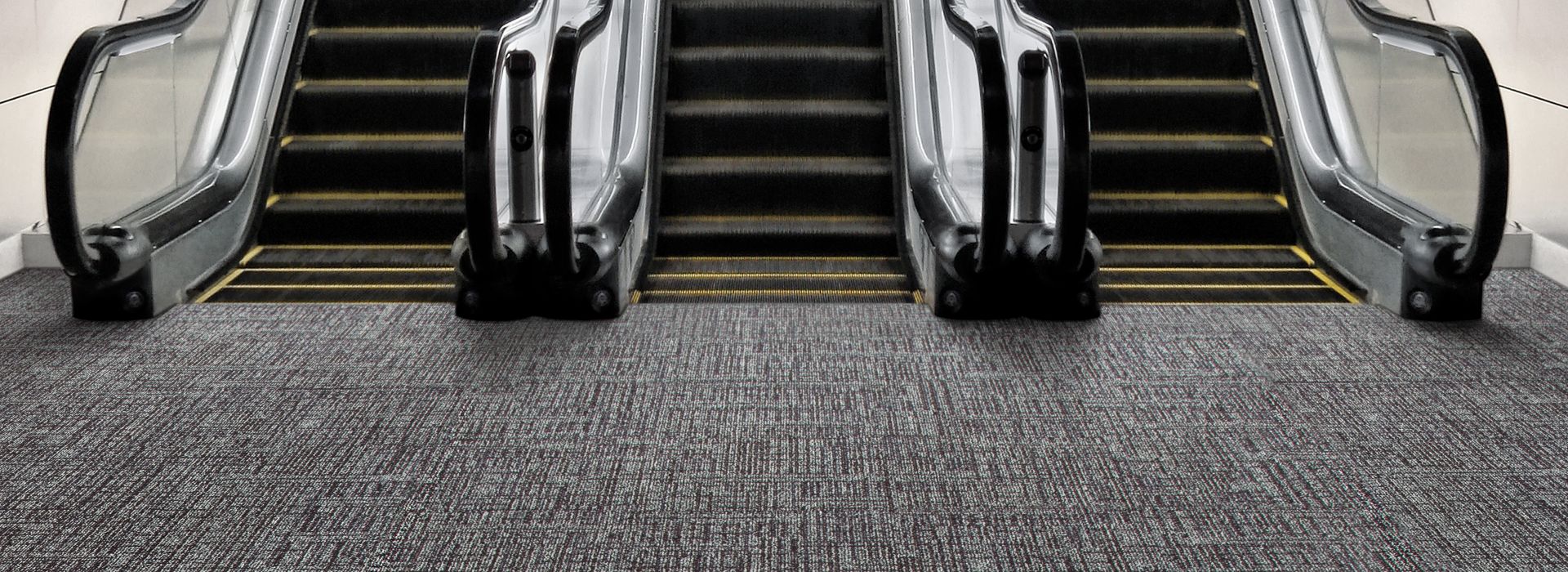 Interface SR899 carpet tile with escalator