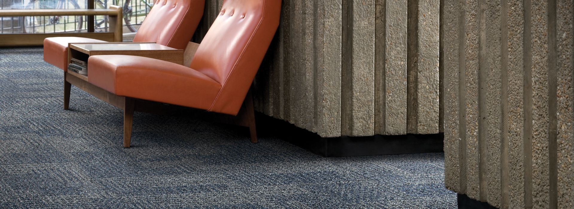 Interface SR999 carpet tile in lobby area with red chairs