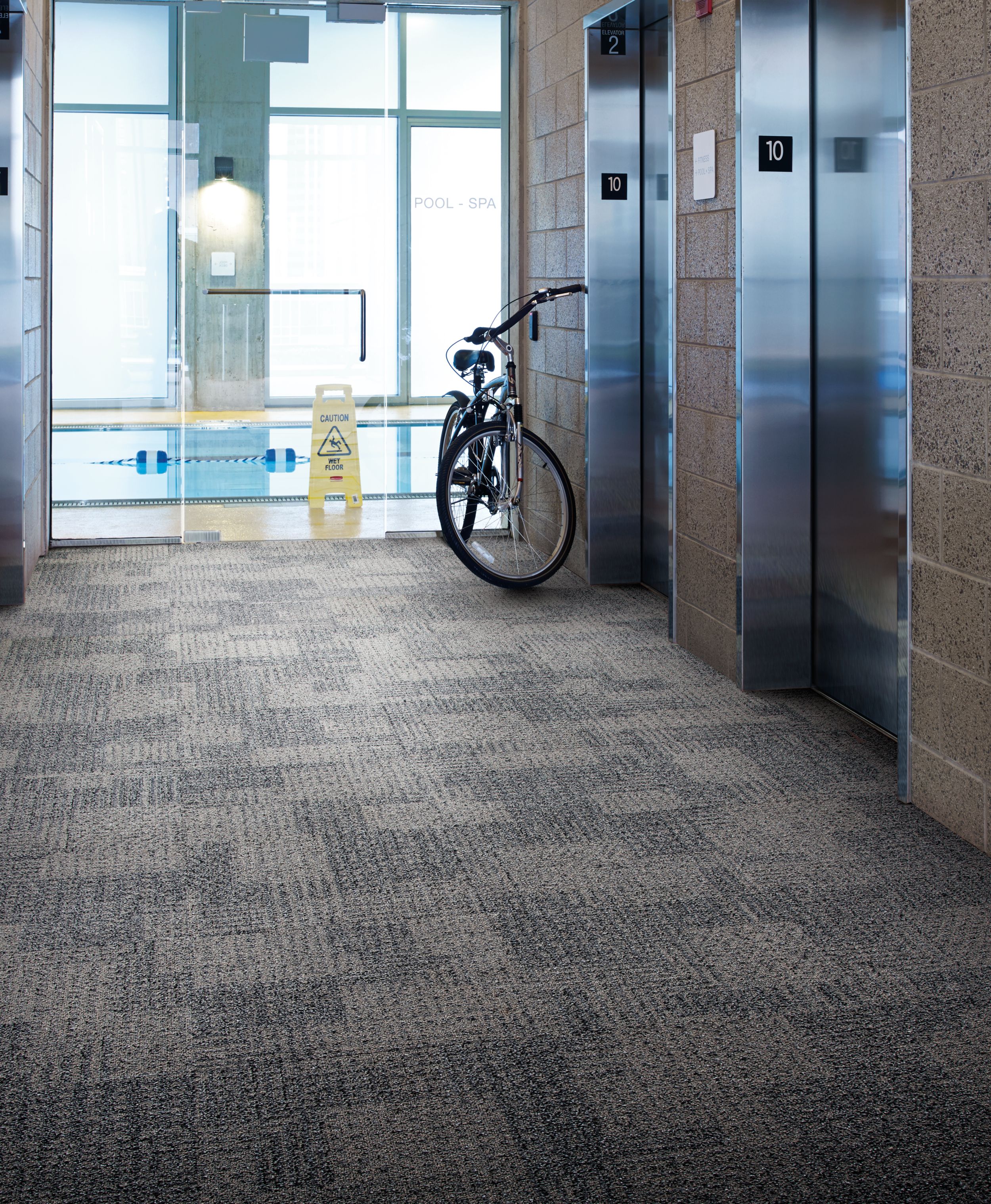 Interface SR999 carpet tile in common area with bike image number 5