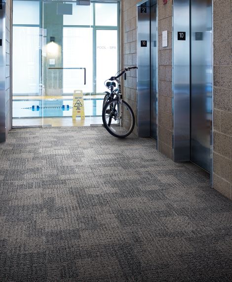 Interface SR999 carpet tile in common area with bike image number 2