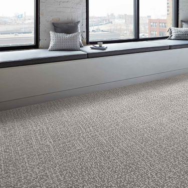 Interface Sashiko Stitch plank carpet tile in common area with bench window seat