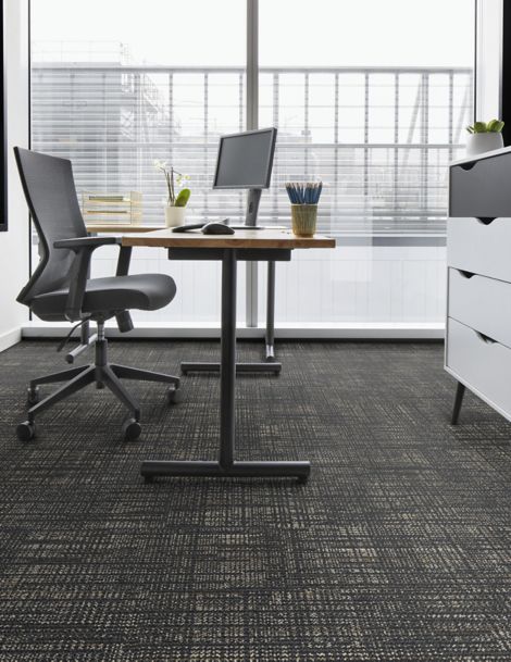 Interface Screen Print plank carpet tile in office with chair and desk