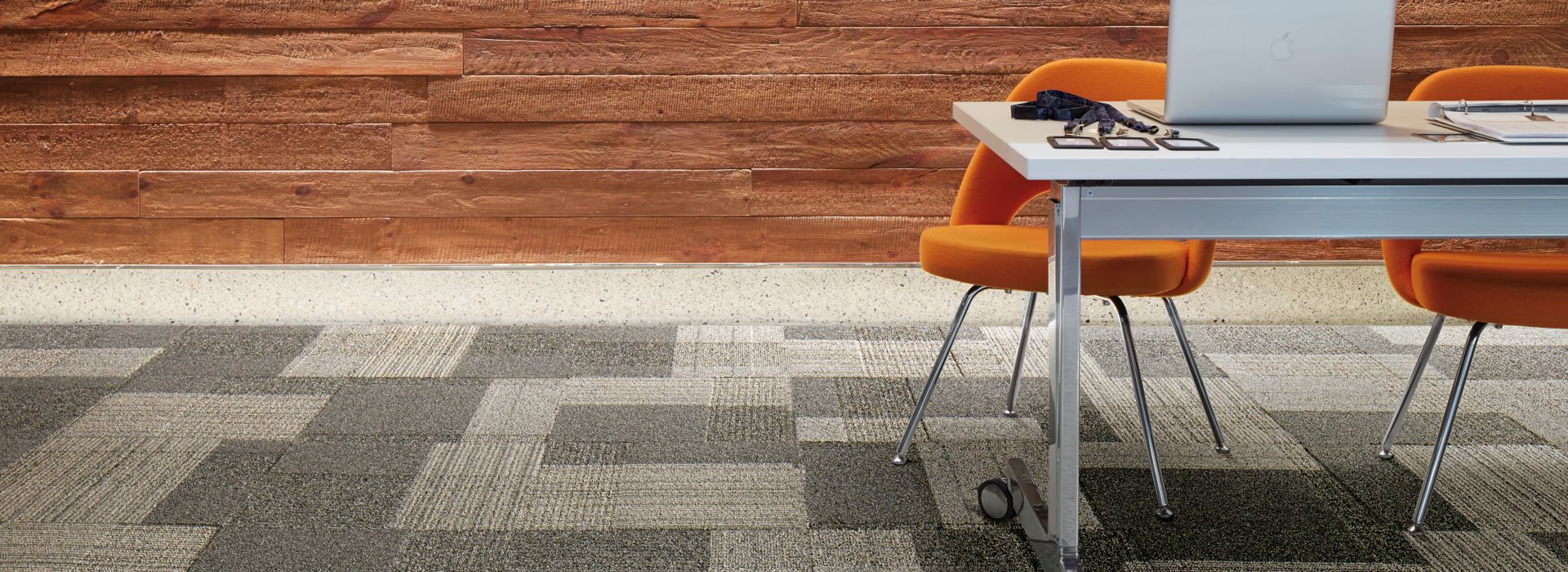 Interface ShadowBox Velour carpet tile in office with wood beam wall and table with computer