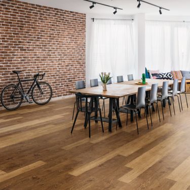 Interface Steady Stride Woodgrains LVT in meeting space with conference table and chairs image number 1