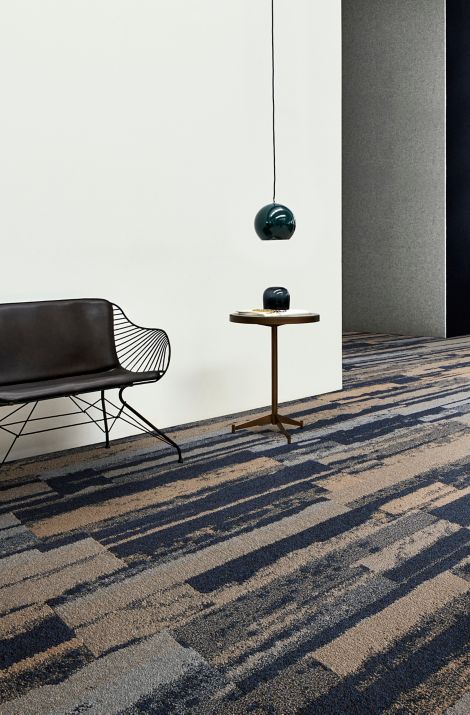 Interface Endless Orbit plank carpet tile in open area with black chair and small table image number 2