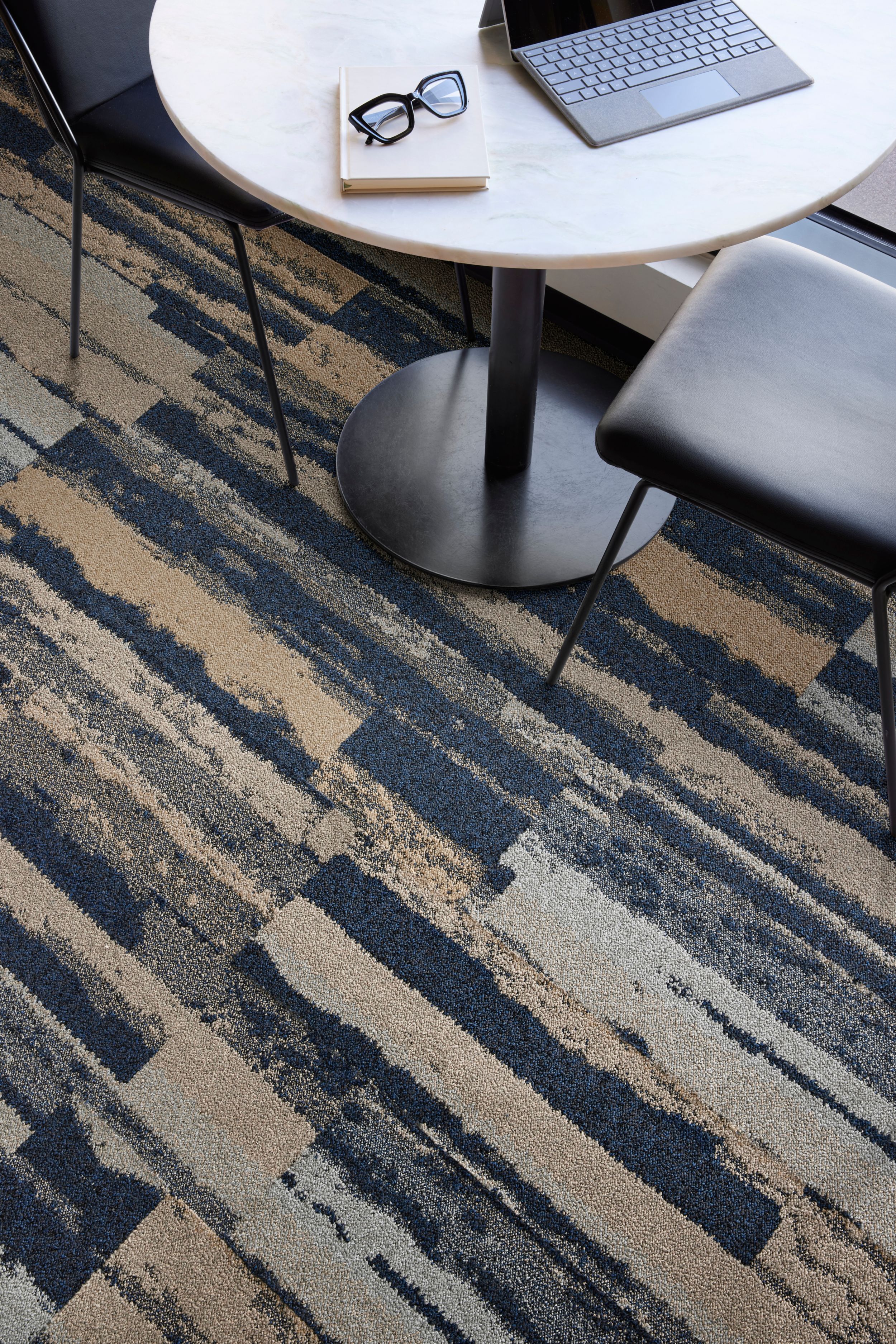 Interface Endless Orbit plank carpet tile in close-up with laptop and glasses image number 3