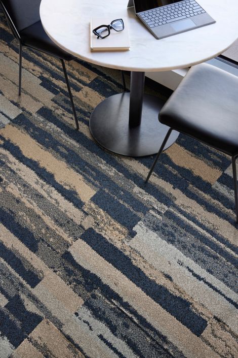 Interface Endless Orbit plank carpet tile in close-up with laptop and glasses image number 3