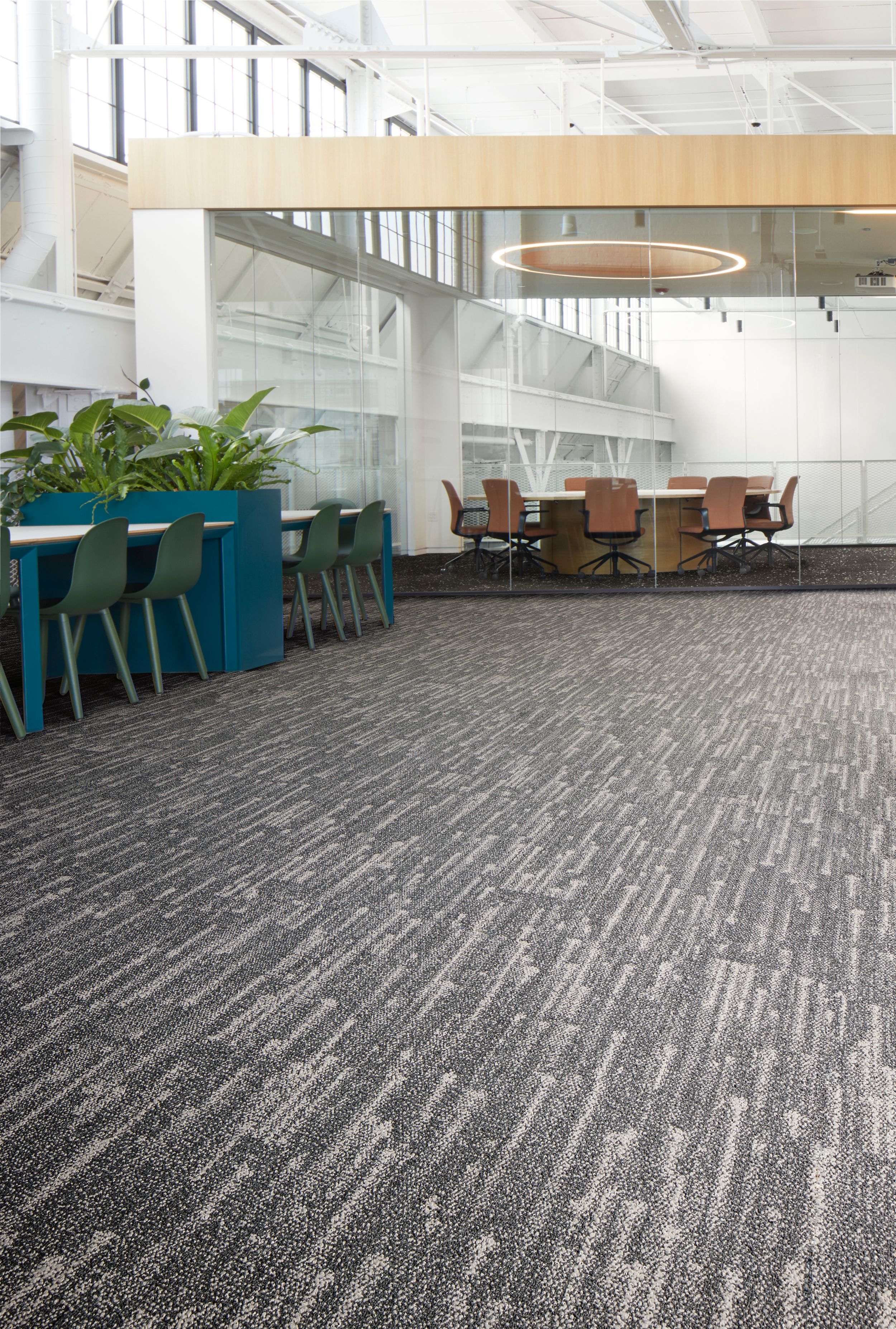 Interface Meteor plank carpet tile in open office with meeting room with glass walls image number 3