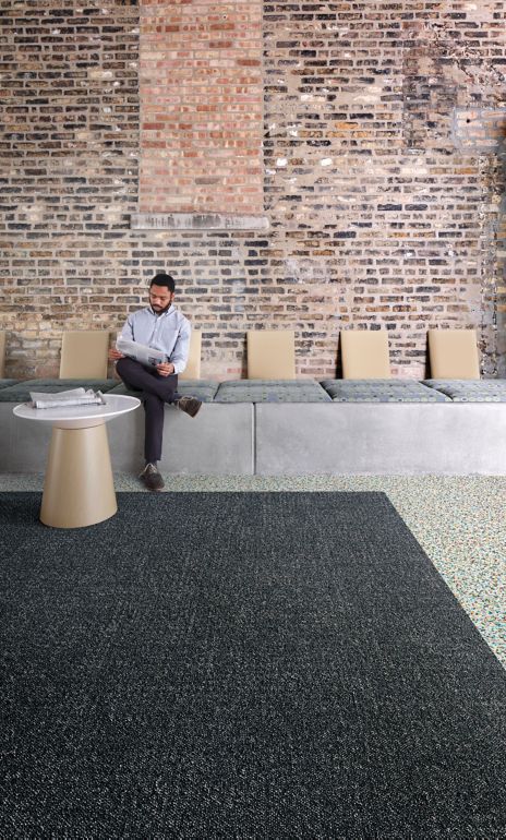 Interface Step it Up and Walk on By carpet tile in sitting area with bench and table 
