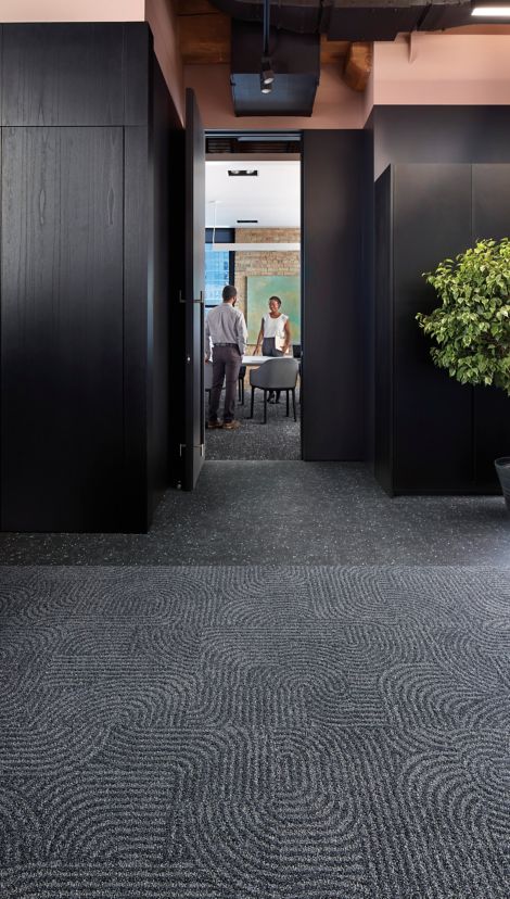 Interface Step this Way and Step Aside carpet tile with Walk the Aisle LVT in an office common area