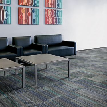 Interface Straight Edge carpet tile in waiting area with table and chairs