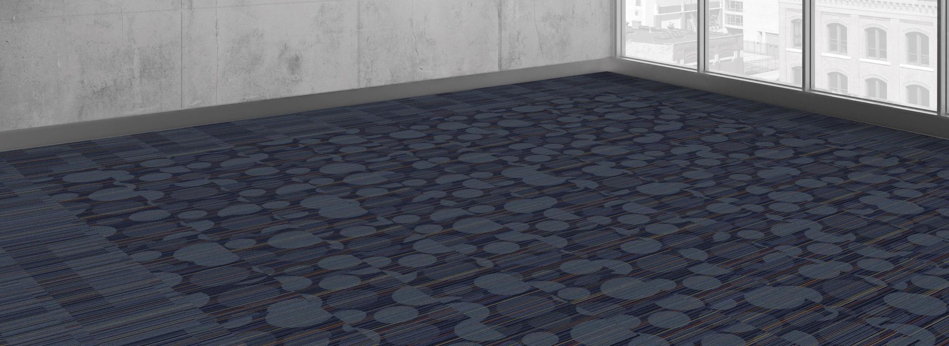 Interface Extra Curricular and Student Council carpet tile in open area with concrete walls