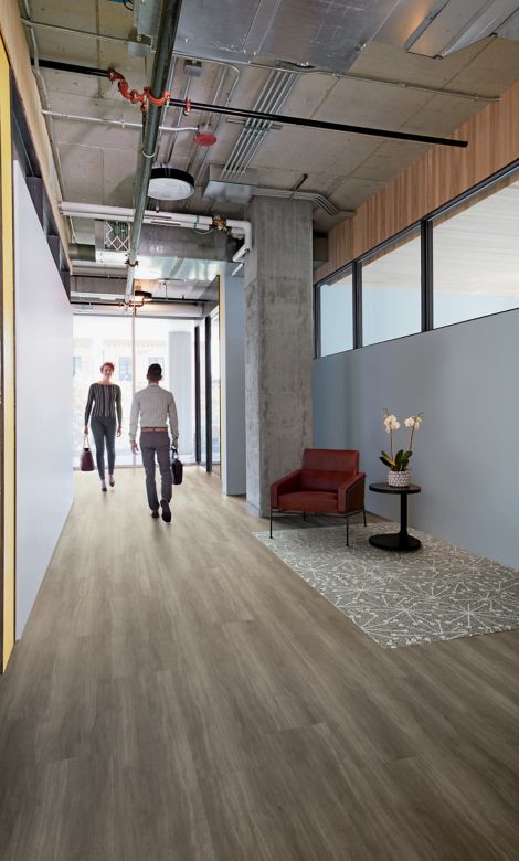 Interface Studio Set LVT and Flor Mod Cafe carpet tile in office common area with table and chair image number 4