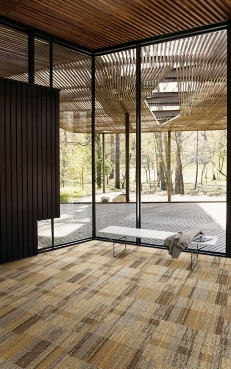 Interface SummerHouse Brights carpet tile in recreation area with wood ceiling and glass walls