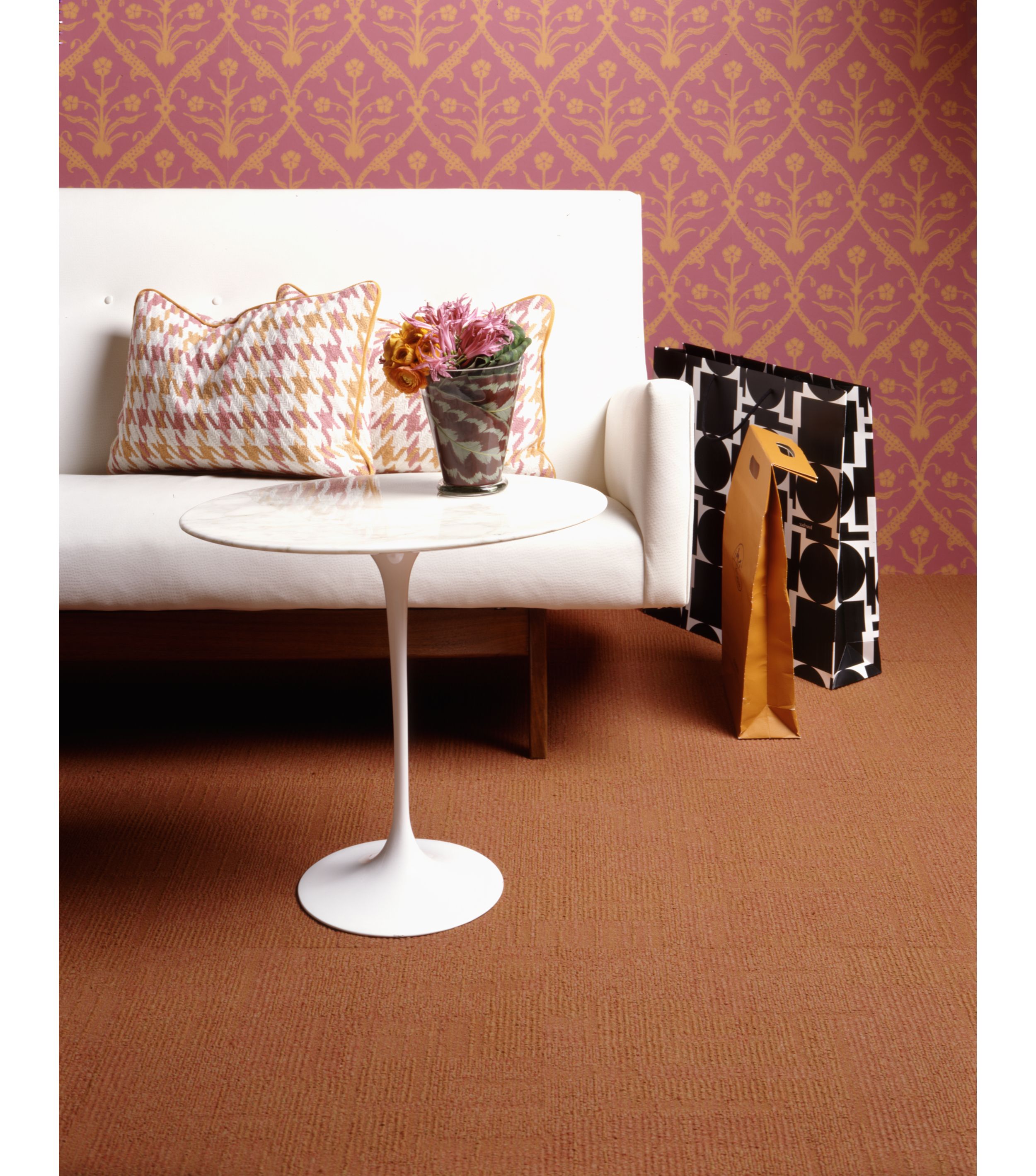 Interface Syncopation carpet tile in seating area with sofa, small whitie table with plant and shopping bags image number 9