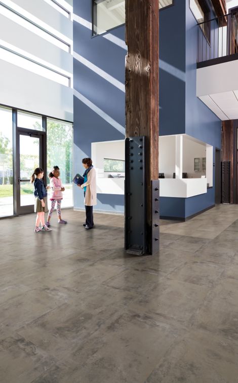 Interface Textured Stones in school lobby setting with column