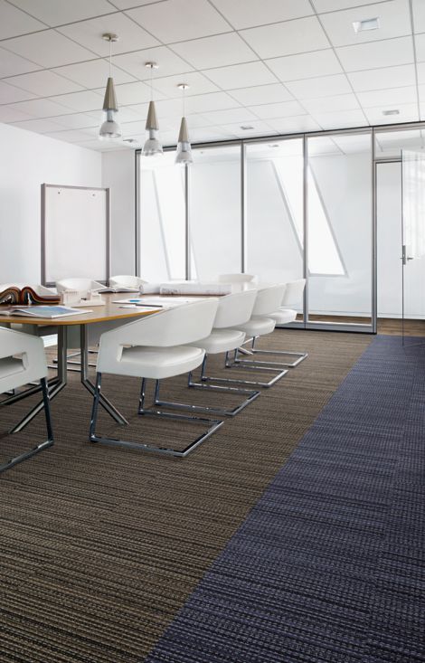 Interface La Paz carpet tile and Textured Woodgrains LVT in glass-enclosed meeting area with white chairs image number 2